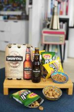 Partymenü „Israelischer Abend mit Freunden“ mit Goldstar-Bier UNFILTERED, Trinkspiel und knusprigen Bissli-Snacks